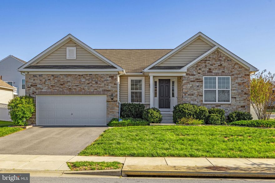 Located on a corner lot in Shenandoah Springs, this beautifully maintained 4-bedroom, 3-bath home built in 2018 combines the ease of main-level living with the added flexibility of a spacious walk-out basement. Set on 0.18 acres, the home features 9-foot ceilings, fresh paint throughout the main level, and a well-designed floor plan suited for both everyday living and entertaining. The main living areas are finished in luxury vinyl plank, with ceramic tile in the bathrooms and laundry room and carpet in the bedrooms. The living room is equipped with a Bose surround sound system, and the kitchen is impressively appointed with granite countertops, stainless steel appliances, soft-close cabinetry, dual wall ovens with convection, a pantry, French door refrigerator, coffee nook, and a large island with seating. Sliding glass doors from the dining area lead to a large concrete patio and fully fenced backyard with vinyl privacy fencing.

The main-level primary suite offers a walk-in shower, double vanity with granite countertops, large walk-in closet, and linen closet. Two additional bedrooms and a full bath on the main level provide added flexibility for guests, office space, or everyday living, along with a laundry room featuring front-loading washer and dryer. The walk-out basement extends the living space with a huge finished recreation room, a fourth bedroom with window egress and walk-in closet, a full bath with granite countertops, and a partially finished exercise room with durable epoxy flooring. The 2-car garage also features epoxy flooring. Additional highlights include a whole-house water filtration system, Nest thermostat, Ring camera, and security system with buyer activation required. Residents of Shenandoah Springs enjoy community amenities including common area maintenance, a pool, basketball and pickleball courts, and tot lots/playgrounds, all in a convenient location near shopping, restaurants, and commuter routes.