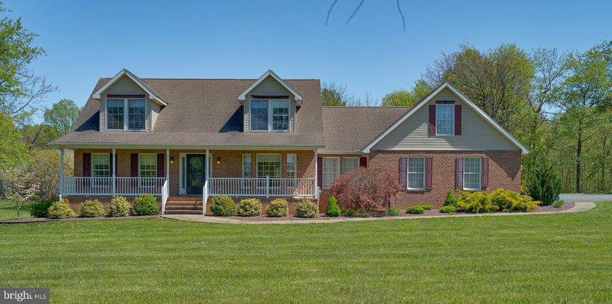 Exceptional 4-Bedroom Home on Over 2 Acres – Main Level Primary Suite, Gourmet Kitchen & Finished Basement!

Welcome to your dream retreat — a beautifully designed 4-bedroom, 3.5-bathroom home perfectly situated on a picturesque, professionally landscaped 2+ acre lot. With timeless curb appeal, mature trees, and expansive outdoor living spaces, this property offers privacy, functionality, and elegant style from the moment you arrive.

Step inside to find gleaming hardwood floors throughout the main level and a spacious primary suite complete with a dual vanity & walk-in closet. Main level laundry and mudroom off of the garage. The heart of the home is the gourmet kitchen, featuring quartz countertops, 42" cabinetry, a double oven, cooktop, and a waist-height built-in microwave for optimal convenience. The peninsula-style layout flows effortlessly into the breakfast nook, formal dining area, and living room — perfect for entertaining guests or enjoying quiet mornings at home.

Upstairs, you'll find spacious secondary bedrooms and a full hall bath with plenty of natural light. The fully finished walk-out basement includes an additional bedroom and full bath, plus two generously sized living areas ideal for a media room, home gym, or guest suite.

Car enthusiasts and hobbyists will love the immaculate 2-bay garage, complete with insulated doors, a full secondary kitchen, and an unfinished upper level that could easily be transformed into an apartment, studio, or bonus living space.

Enjoy year-round outdoor living with a screened-in back porch, a large covered front porch, and a generous patio area perfect for summer grilling or hosting gatherings.

Located in a peaceful setting with easy access to I-81, shopping, and local conveniences — this home truly offers the best of both comfort and location.