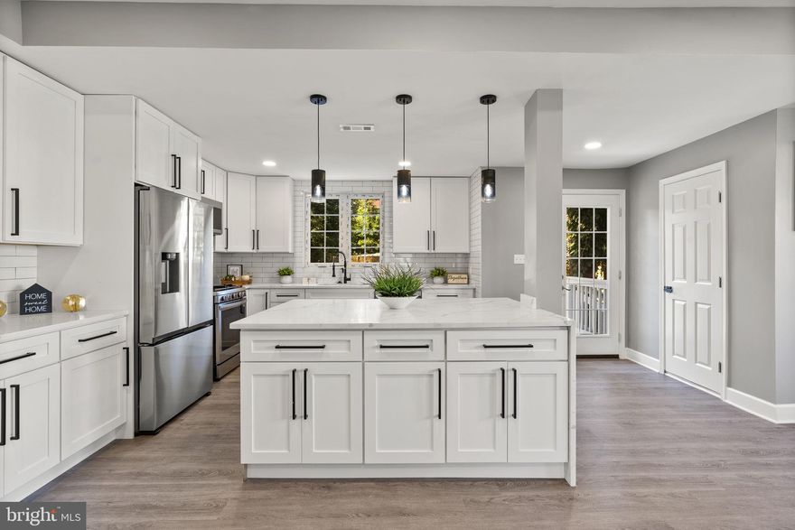 Welcome to 3417 Springdale Ave, a remarkable 5bd/5.5ba renovation in the heart of Forest Park. Featuring a massive open floor plan, enormous brand new kitchen, spa-like primary bath, fully finished basement and off street parking! You'll have no problem entertaining guests with the large open main level, which offers flexible living arrangements and large spaces to cater to your everyday needs. The star of the main level is the brand new kitchen, which offers a massive island with waterfall quartz countertops, plenty of storage space, brand new appliances and a chic tile back splash. The main level is completed with a powder room for convenience. Upstairs offers two guest bedrooms and a hall bathroom, plus a large owner's suite. Anchored by the spacious primary bath with freestanding tub and full tile surround, this bathroom is like none-other in the area! The primary suite also offers a walk in closet for all of your storage needs. The third level offers two additional guest bedrooms and two guest bathrooms. The home is completed by the fully finished basement with an additional fifth bathroom, plus a large rear yard. Stop in today and prepare to be amazed by this home's transformation!