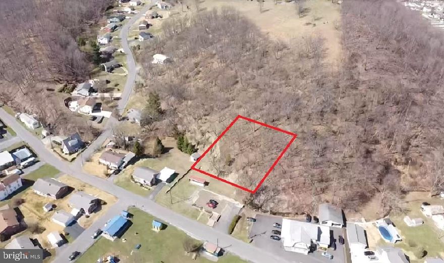 Awesome opportunity to own a lovely building lot in the heart of Keyser!  Access is via right of way off of Old Orchard Drive.  Road is grown up, a vehicle cannot go through.