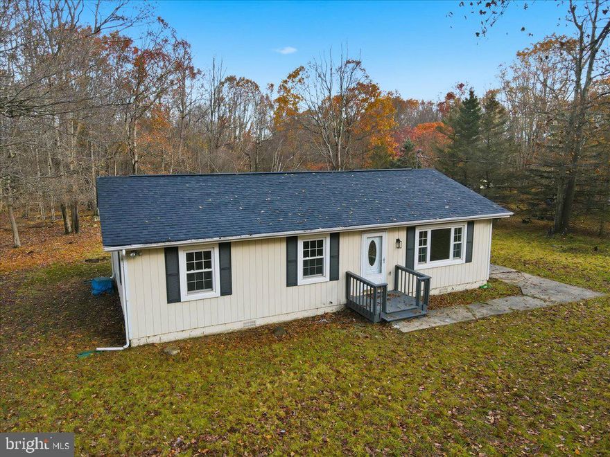 No Dues or Community. Within Walking Distance Of School. Outdoor activities and Indoor Activities are very close. This Ranch Home has been completely remodeled on the inside, New Doors, Luxury Vinyl Floors Thru-out, New Appliances in the Kitchen including propane Range. Stackable Washer and Dryer in Laundry, with Tankless Hot Water system. Large Three Bedrooms and a newer Main Bath. All will be found on a Flat Acre Parcel of ground. Forced Hot Air Heat and Central Air will finish off this home for you.