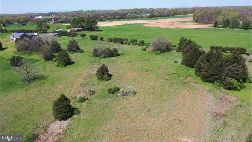Fauquier County - 4 Acres at the corner of Herdland Ln & Germantown Rd in Midland, VA.  This lot has a  mixture of cleared land & foliage. It offers wonderful views of farmland & is ready for your dream home. Approved for a 4 BR alternative septic system.  Seller has done all the legwork saving buyer time & $ - approx. $5,000.  Approved for an ADU - an additional dwelling unit with size restrictions. That's 2 homes on 1 lot & perfect for multigenerational living. Call FQ County Zoning for details. Only 1/2 a mile from Rte 28. Minutes from Warrenton & Nokesville. Close to CM Crockett Park, equestrian events, wineries, farm markets & breweries. No HOA nor restrictions.  By appt only. Sign on Property.