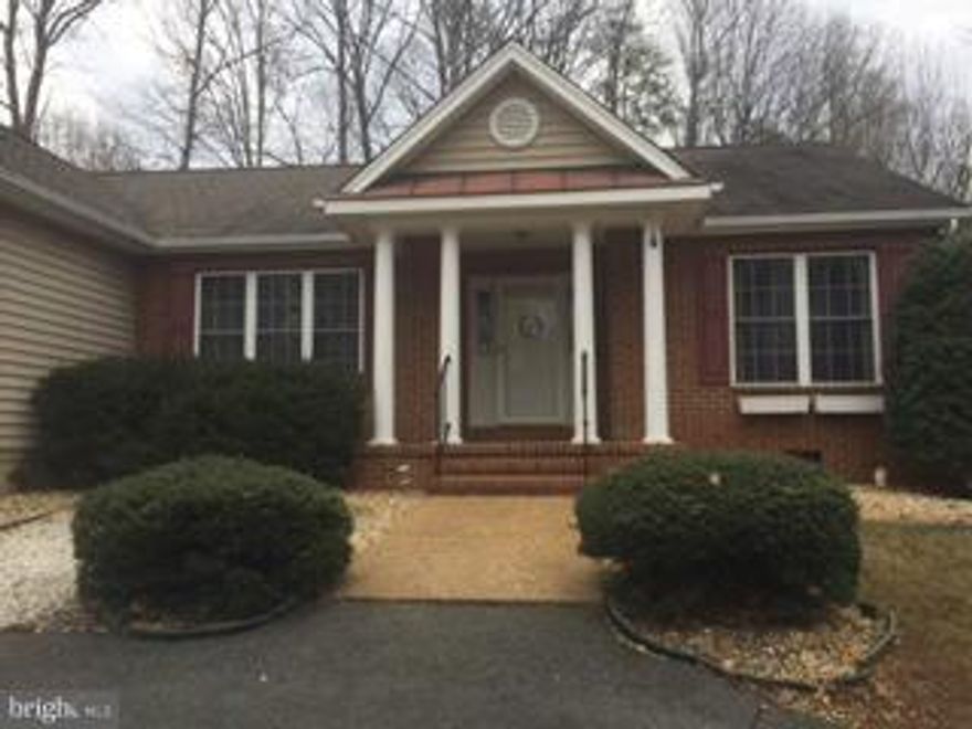 One level living with an open floor plan!  MUST SEE! This home features custom cabinets surrounding the fireplace in the living room.  Vaulted ceilings and skylights. Enjoy the patio with a wooded backdrop.