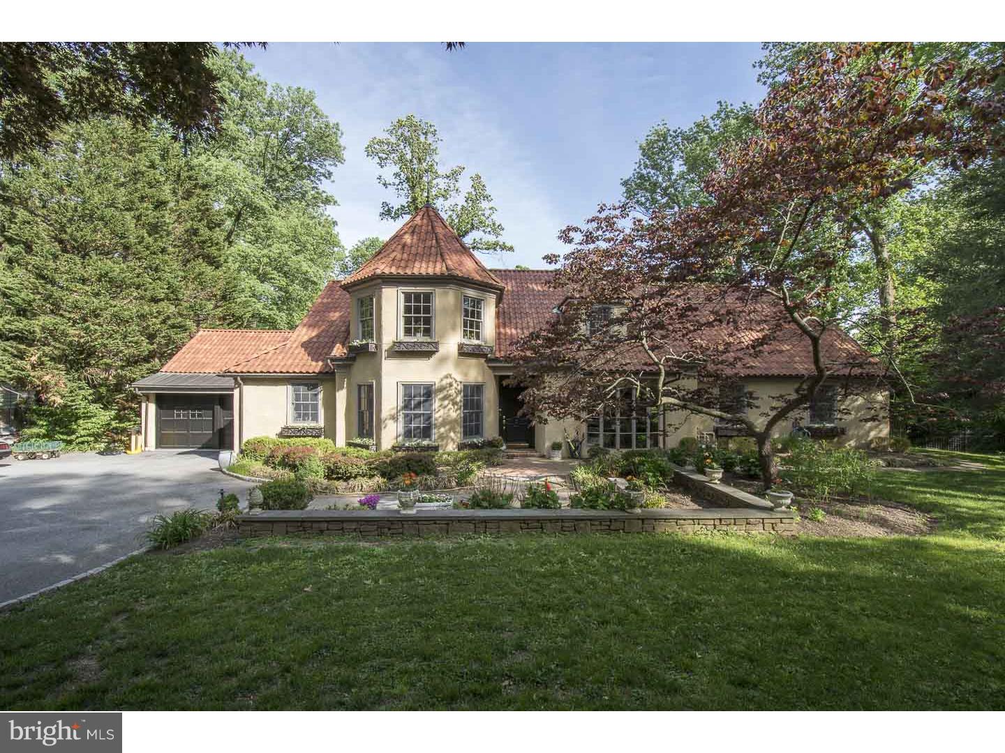 Magnificent, Renovated, 5 Bedroom, 4.2 Baths, 6755 sq ft French Estate which sits eloquently on a spectacular level 1.26 acres. This home which has been beautifully updated featuring stunning hardwood floors throughout the first floor, a wood paneled Library/Office with floor to ceiling bay windows and French Doors to hallway, Sizeable Dining Room with Crown Molding. Open Kitchen with top-of-the-line built in appliances, granite countertops lots of cabinet space, Butler's Pantry and bright Breakfast Room with access to back deck. Wonderful, enormous, Great Room with fireplace and French Doors leading to Balcony overlooking the tranquil park-like grounds which is perfect for entertaining. Relax by the fire and enjoy the views from the oversized first floor Master Bedroom Suite with private balcony, cathedral ceilings, and spacious Marble Master Bath with soaking tub and sizeable, custom, marble shower. Second floor is complete with two spacious bedrooms with Jack-and-Jill bathroom, additional room with private bath and loads of storage space in the cedar closet. Main Floor Laundry and Powder Room. Finished Basement with spacious Family Room, another Bedroom, wine cellar and Full Bath. Enjoy summers by the pool on the slate patio or enter through wall of sliders to cool off in the separate Pool House's sitting area with fireplace, Full Kitchen with breakfast bar, one and half baths, Sauna, and a swim out feature complete this second living space. Move right in and enjoy all this home has to offer! 2-car garage. Award-Winning Lower Merion Schools. Sought-after location on a fantastic street!