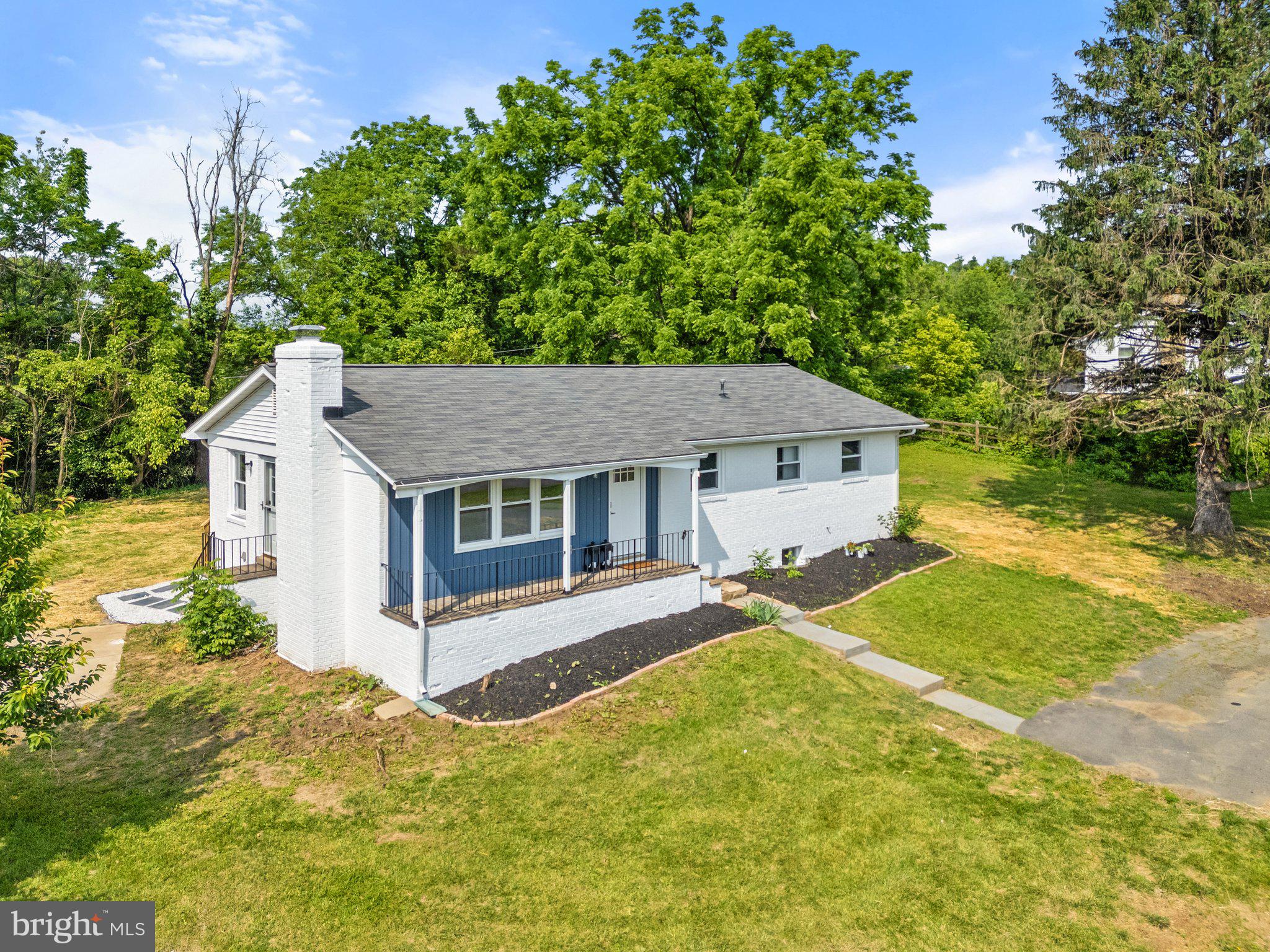 Completely reimagined and fully permitted renovation on a private 1-acre lot with no HOA, just 10 minutes from the heart of downtown Leesburg. This stunning 4-bedroom, 3-bathroom home offers the rare combination of modern finishes, thoughtful design, and a peaceful, estate-like setting—conveniently located near shopping, dining, commuter routes, and historic charm.
Every aspect of this home has been meticulously updated with proper permits and inspections in place. Major improvements include all-new plumbing, electrical, HVAC, basement windows, doors, insulation, and more. See full list of updates in the docs. The brand-new kitchen is equipped with custom soft-close cabinetry, gorgeous natural stone countertops, a center island, and premium stainless steel appliances. Each of the three full bathrooms has been professionally designed with timeless tile selections and contemporary fixtures.
The home’s flexible layout features three bedrooms and two full baths on the main level, along with a spacious living room and open-concept kitchen and dining area—perfect for entertaining. The fully finished walk-up basement includes an additional bedroom, a full bath, large rec room, and laundry area—ideal for guests, multi-generational living, or a private office setup.
Enjoy morning coffee or host gatherings on the oversized 12' x 40' rear deck, overlooking a level and usable backyard surrounded by mature trees. Located on a quiet cul-de-sac with easy access to Route 7 and the Dulles Greenway, this property offers the privacy of country living with the convenience of in-town amenities.
Truly turnkey and move-in ready with every major system and surface replaced—this is a rare opportunity to own a completely modernized home in a sought-after location with no restrictive covenants.