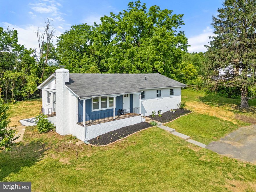 Completely reimagined and fully permitted renovation on a private 1-acre lot with no HOA, just 10 minutes from the heart of downtown Leesburg. This stunning 4-bedroom, 3-bathroom home offers the rare combination of modern finishes, thoughtful design, and a peaceful, estate-like setting—conveniently located near shopping, dining, commuter routes, and historic charm.

Every aspect of this home has been meticulously updated with proper permits and inspections in place. Major improvements include all-new plumbing, electrical, HVAC,  basement windows, doors, insulation, and more. See full list of updates in the docs. The brand-new kitchen is equipped with custom soft-close cabinetry, gorgeous natural stone countertops, a center island, and premium stainless steel appliances. Each of the three full bathrooms has been professionally designed with timeless tile selections and contemporary fixtures.

The home’s flexible layout features three bedrooms and two full baths on the main level, along with a spacious living room and open-concept kitchen and dining area—perfect for entertaining. The fully finished walk-up basement includes an additional bedroom, a full bath, large rec room, and laundry area—ideal for guests, multi-generational living, or a private office setup.

Enjoy morning coffee or host gatherings on the oversized 12' x 40' rear deck, overlooking a level and usable backyard surrounded by mature trees. Located on a quiet cul-de-sac with easy access to Route 7 and the Dulles Greenway, this property offers the privacy of country living with the convenience of in-town amenities.

Truly turnkey and move-in ready with every major system and surface replaced—this is a rare opportunity to own a completely modernized home in a sought-after location with no restrictive covenants.