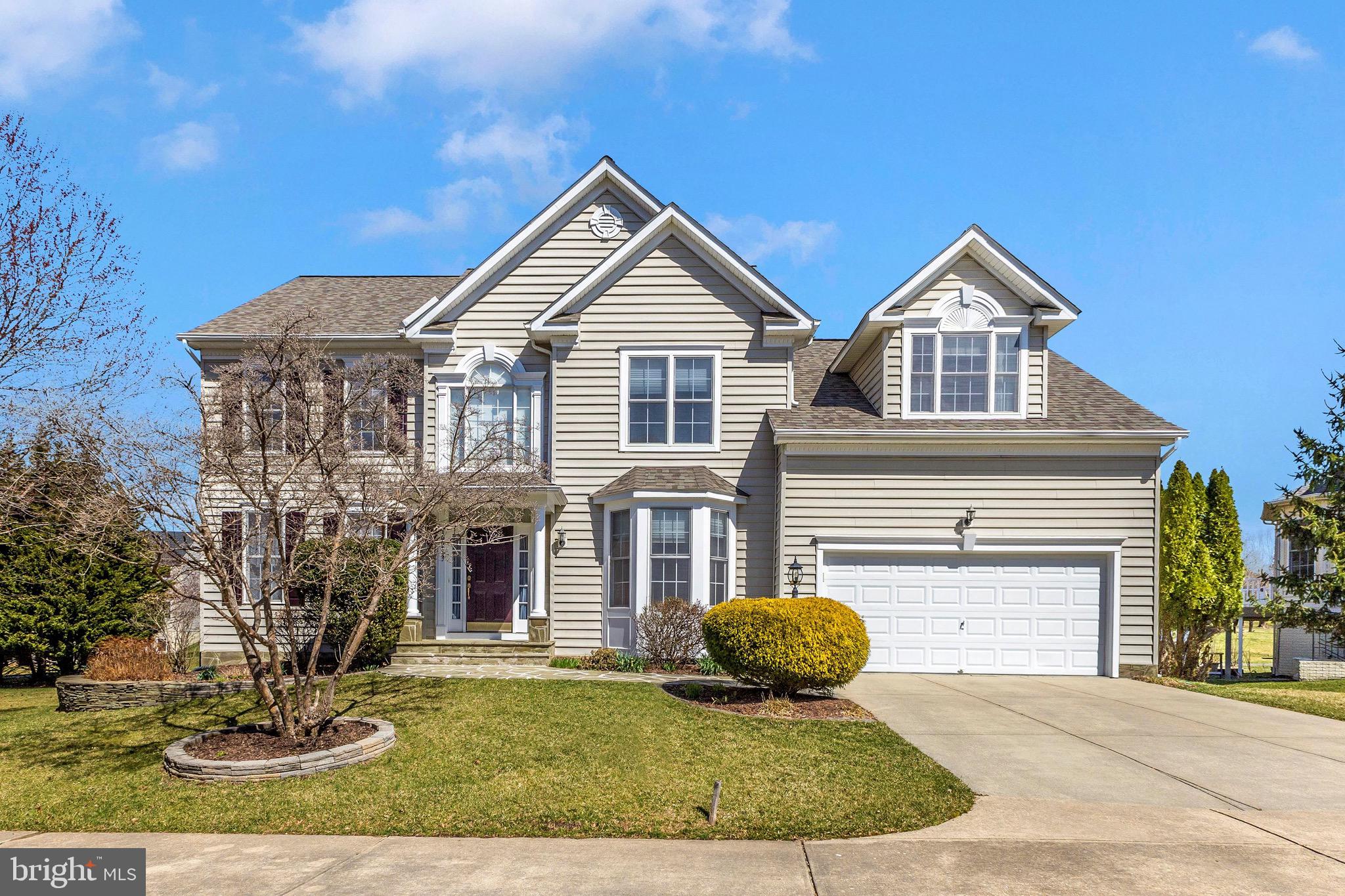Beautiful 5 bedroom, 4 bath home with over 4,200 square feet of living space in the Emerson community, North Laurel! Three levels of comfortable living with new solid oak hard wood floors and paint on the main level and 2nd floor, fully finished walk-out basement and storage galore. Beautiful and functional floorplan with open entry way, elegant living and dining rooms and a chef’s kitchen with double wall ovens, ample counters and cabinets and walk-in pantry with brand new refrigerator, microwave, and cooktop. The breakfast nook leads into the expansive family room with vaulted ceiling and gas fireplace. A full bath and guest room/office complete the main floor. Upstairs you will find a bright and airy primary bedroom with a large walk-in closet, several additional closets, and a large ensuite with soaking tub and separate shower. Enjoy the ease of a top-floor laundry room, perfectly positioned near the bedrooms for ultimate convenience. The finished basement includes 2 additional bonus rooms that could be used as additional bedrooms or office space. The basement includes a game/flex room, a full bath with double sinks, and two generous storage areas, adding functionality to the home. This home features a brand-new HVAC system (installed just 4 months ago) and a new roof and water heater, both just 2 years old—offering peace of mind and energy efficiency for years to come! The HVAC is a dual-unit system, ensuring customized climate control throughout the home. Enjoy built-in speakers for immersive sound and a modern security system for added peace of mind. Nestled on a quiet cul-de-sac, this home boasts a spacious, level yard with a deck, paver patio, and mature trees, creating a tranquil, park-like retreat perfect for relaxation and outdoor enjoyment 5-minute walk to Gorman Crossing Elementary school and Murray Hill Middle school (no need to cross a street), and 2-minute walk to playground. Step out your back door and onto the community walking path! This home offers direct backyard access to scenic trails, perfect for morning jogs, evening strolls, or a relaxing walk with your pet. Enjoy living in a neighborhood featuring multiple playgrounds, charming little libraries, miles of scenic walking trails, and a variety of community activities—perfect for all ages! This community offers a large pool with lap lanes and a beach area, a gated baby pool, and upgraded bathrooms with showers. Enjoy two tennis courts with pickleball lines, a rentable common room, and a spacious upstairs facility for events. There’s also a fitness center and on-site management office for added convenience. This home has been meticulously maintained, and you really have to see it for yourself to appreciate all the care and attention it’s received. The quality and attention to detail make it stand out as a truly exceptional property. **No Front Foot Fee!**Don’t miss this opportunity to live in one of the best communities in Howard County!