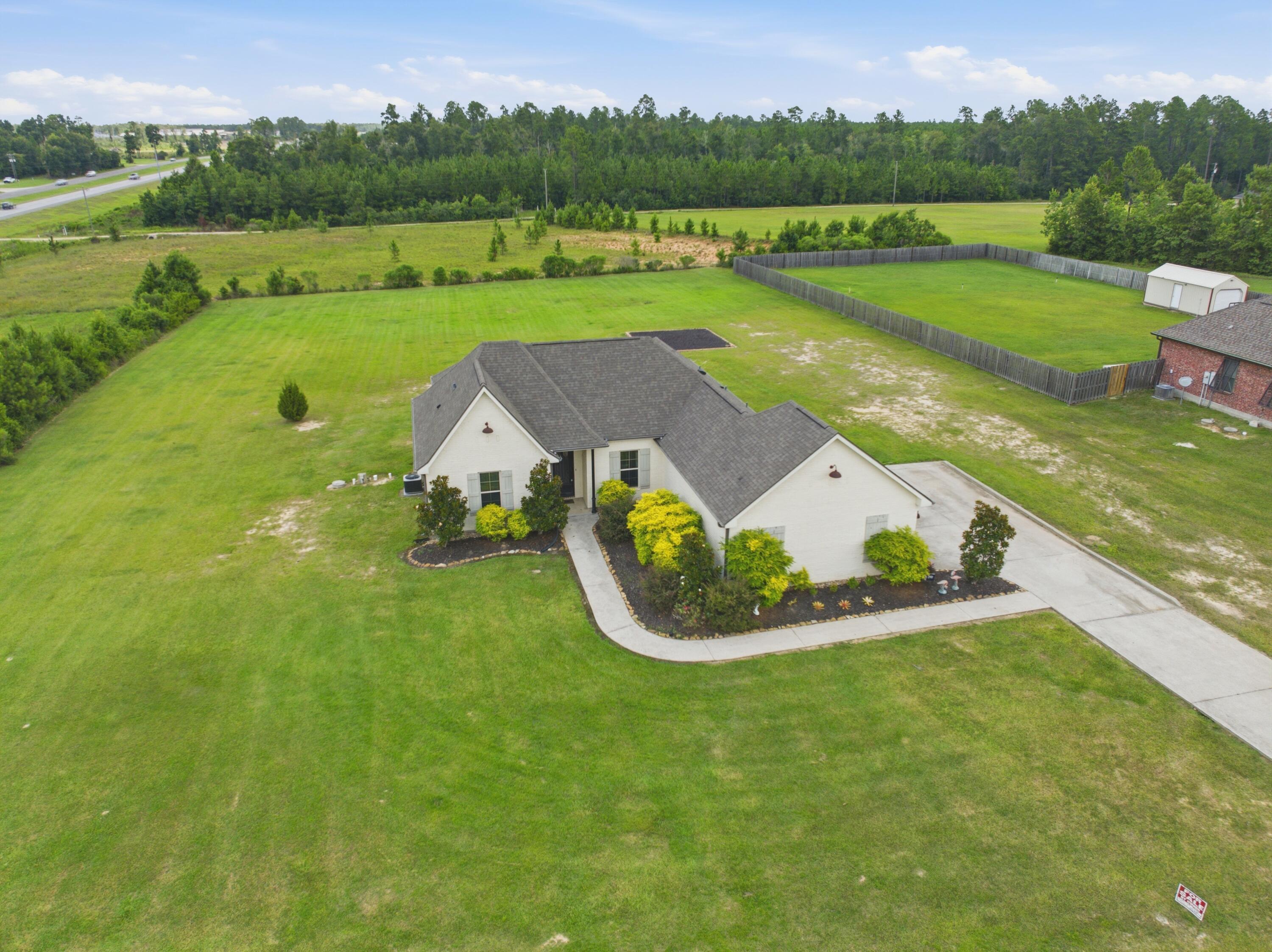Photo 1 of 16 — 133 Plantation Trace, Longville, LA 70652