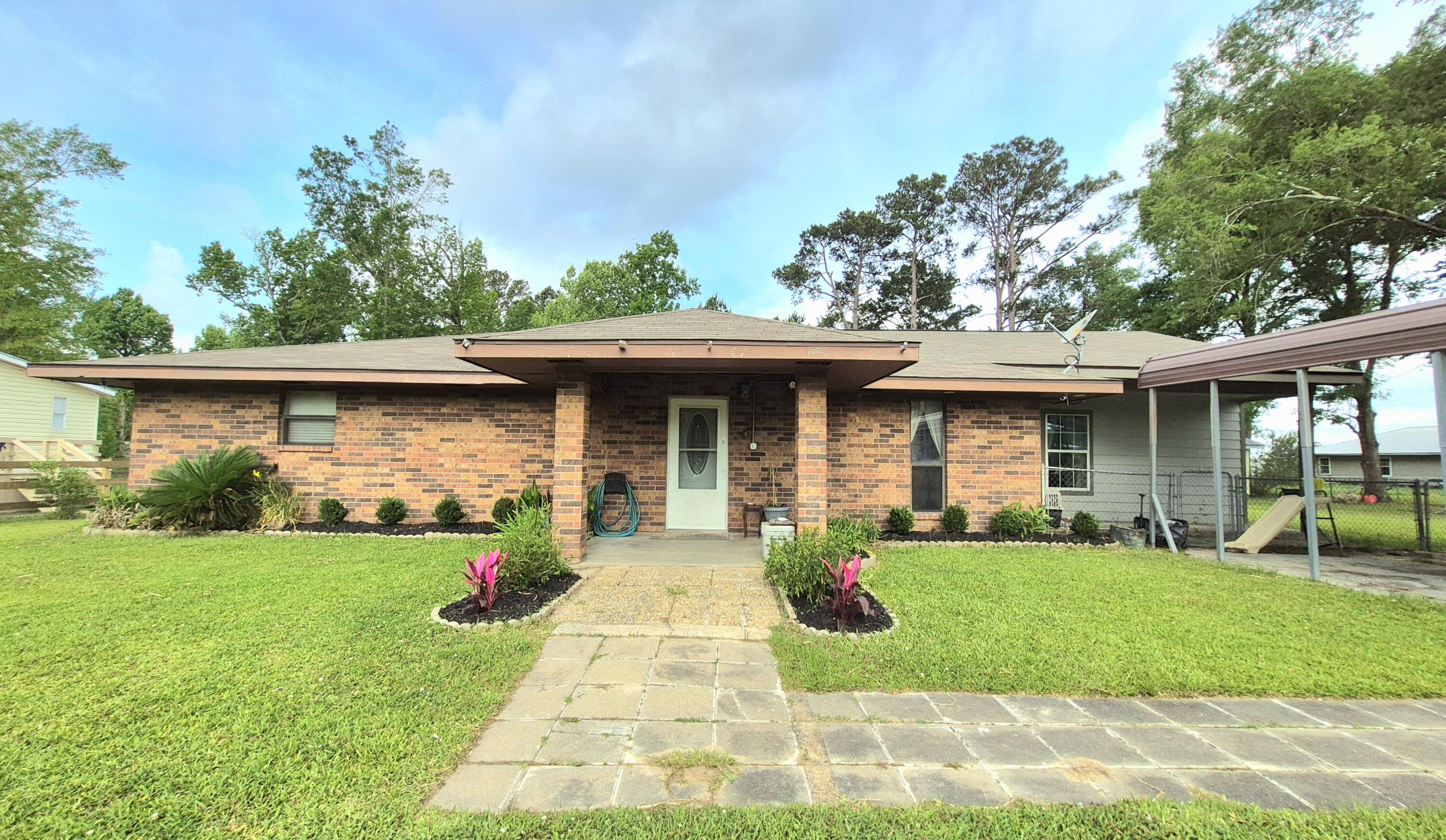 Photo 1 of 15 — 144 Cypress, Longville, LA 70652