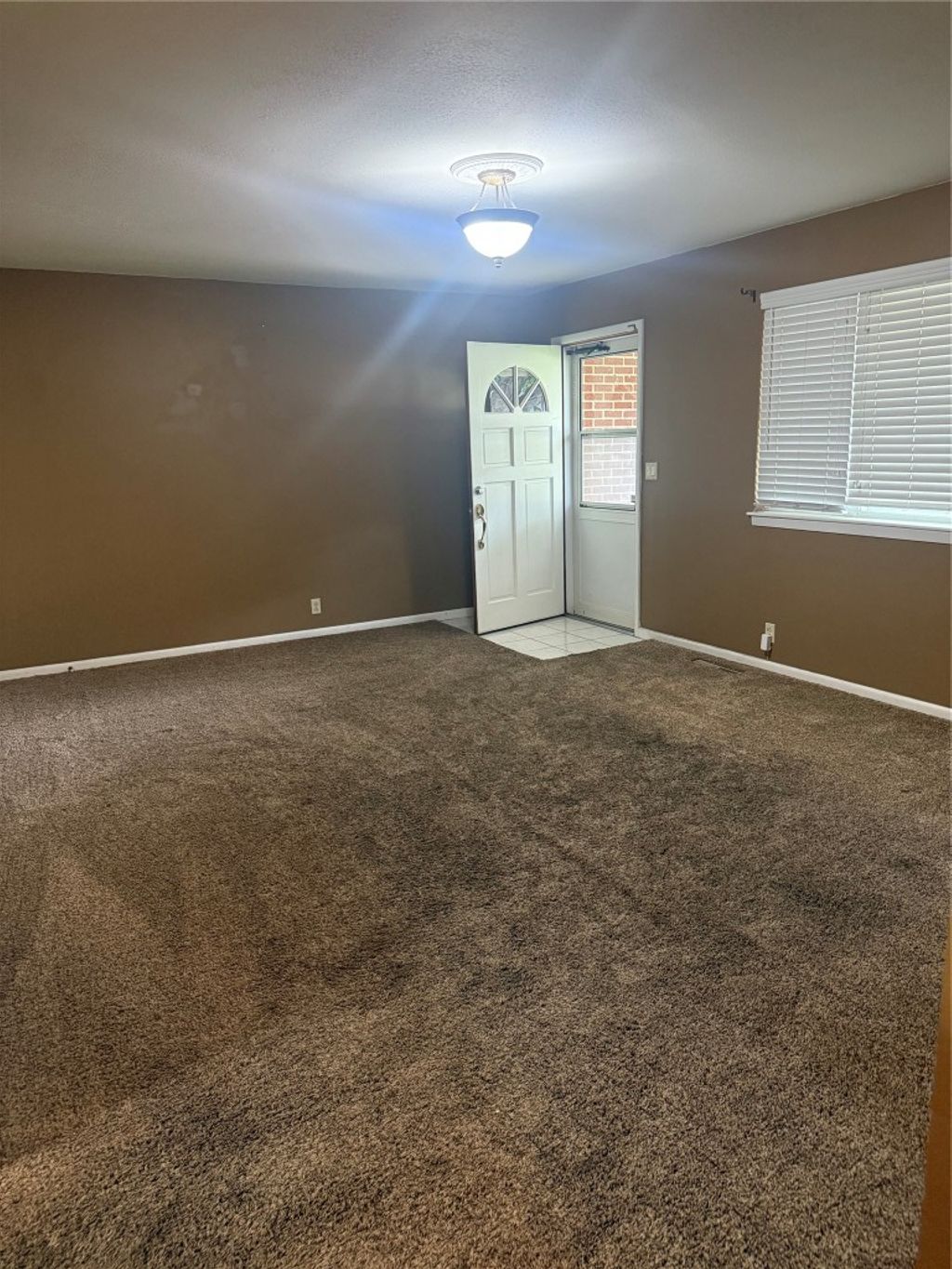 Photo of 1709 Parkwood Lane, Garden City, KS 67846 (MLS # 100750)