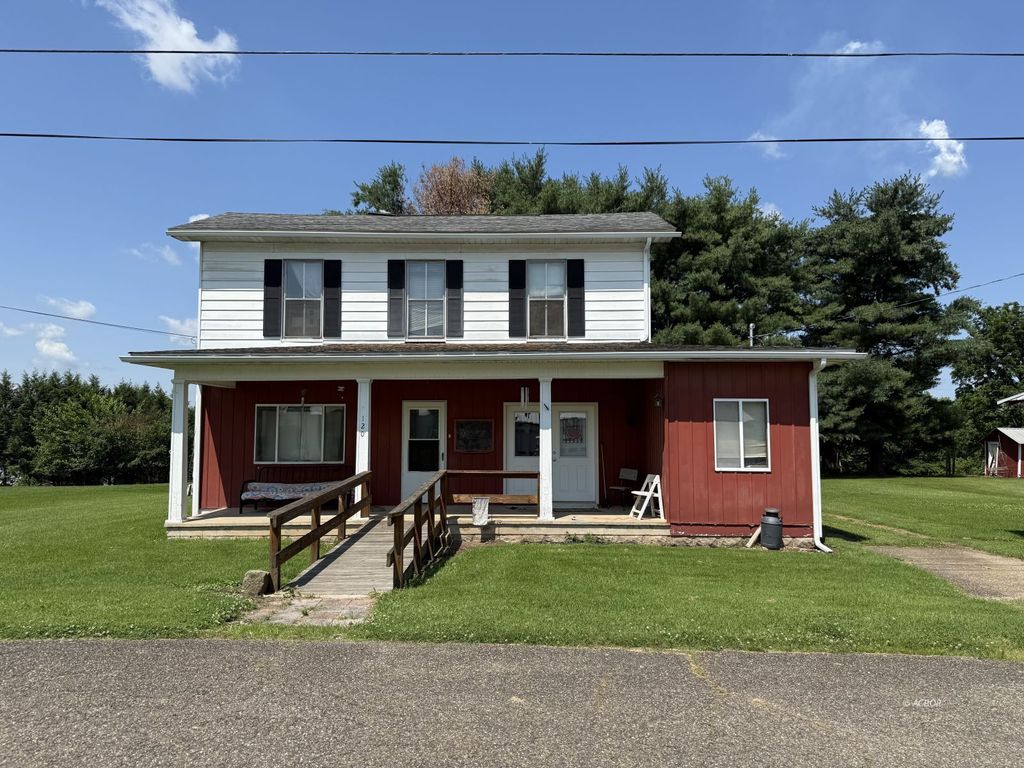 Photo of 120 N Broadway St, Racine, OH 45771 (MLS # 2433613)