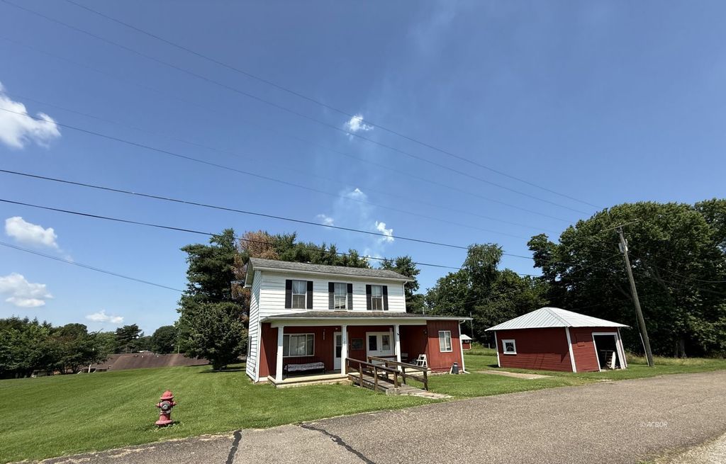 Photo of 120 N Broadway St, Racine, OH 45771 (MLS # 2433613)