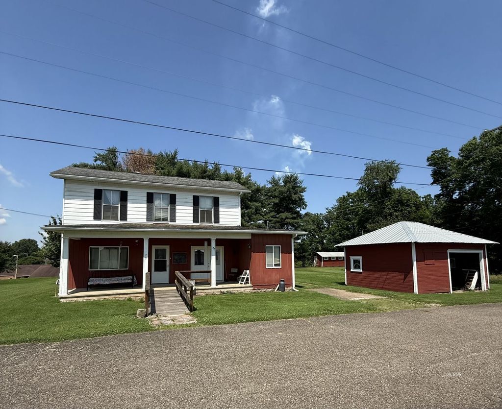 Photo of 120 N Broadway St, Racine, OH 45771 (MLS # 2433613)