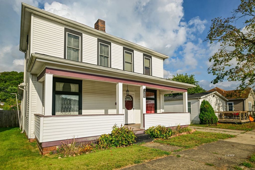 Photo of 874 Chestnut St, Nelsonville, OH 45764 (MLS # 2434017)
