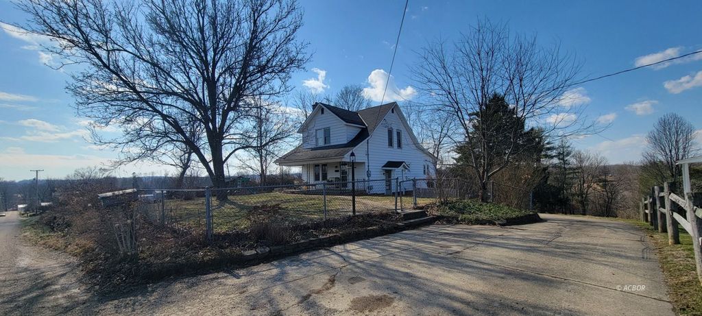 Photo of 8387 Steinmeyer Rd, New Marshfield, OH 45766 (MLS # 2434529)