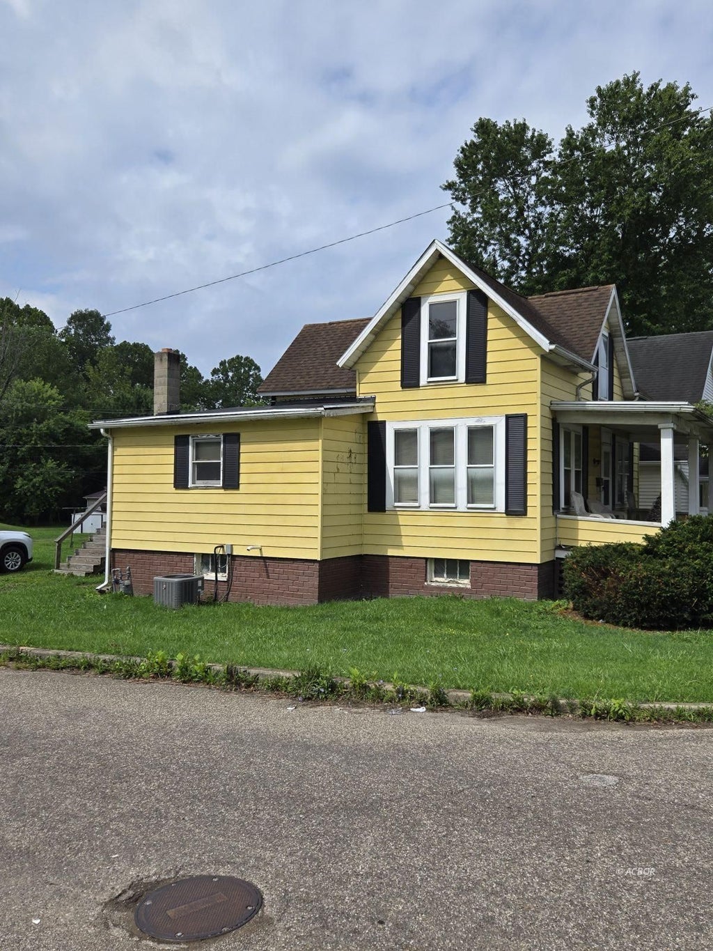 Photo of 18 Braun ST, Glouster, OH 45732 (MLS # 2435357)