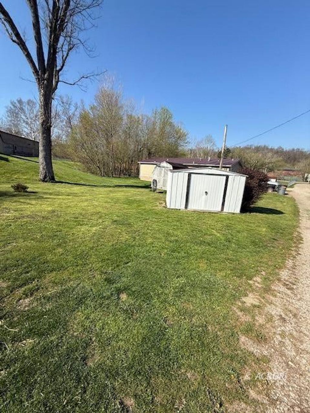 Photo of 1 Cardaras Dr, Glouster, OH 45732 (MLS # 2434752)