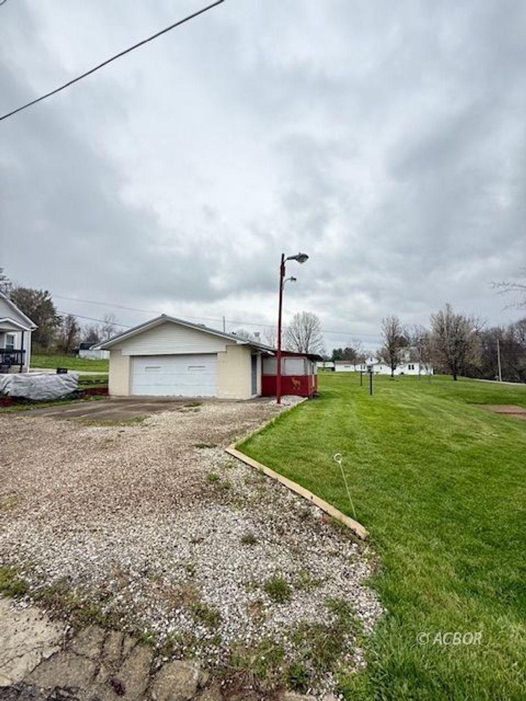 Photo of 4042 Railroad Street St, New Marshfield, OH 45766 (MLS # 2434673)