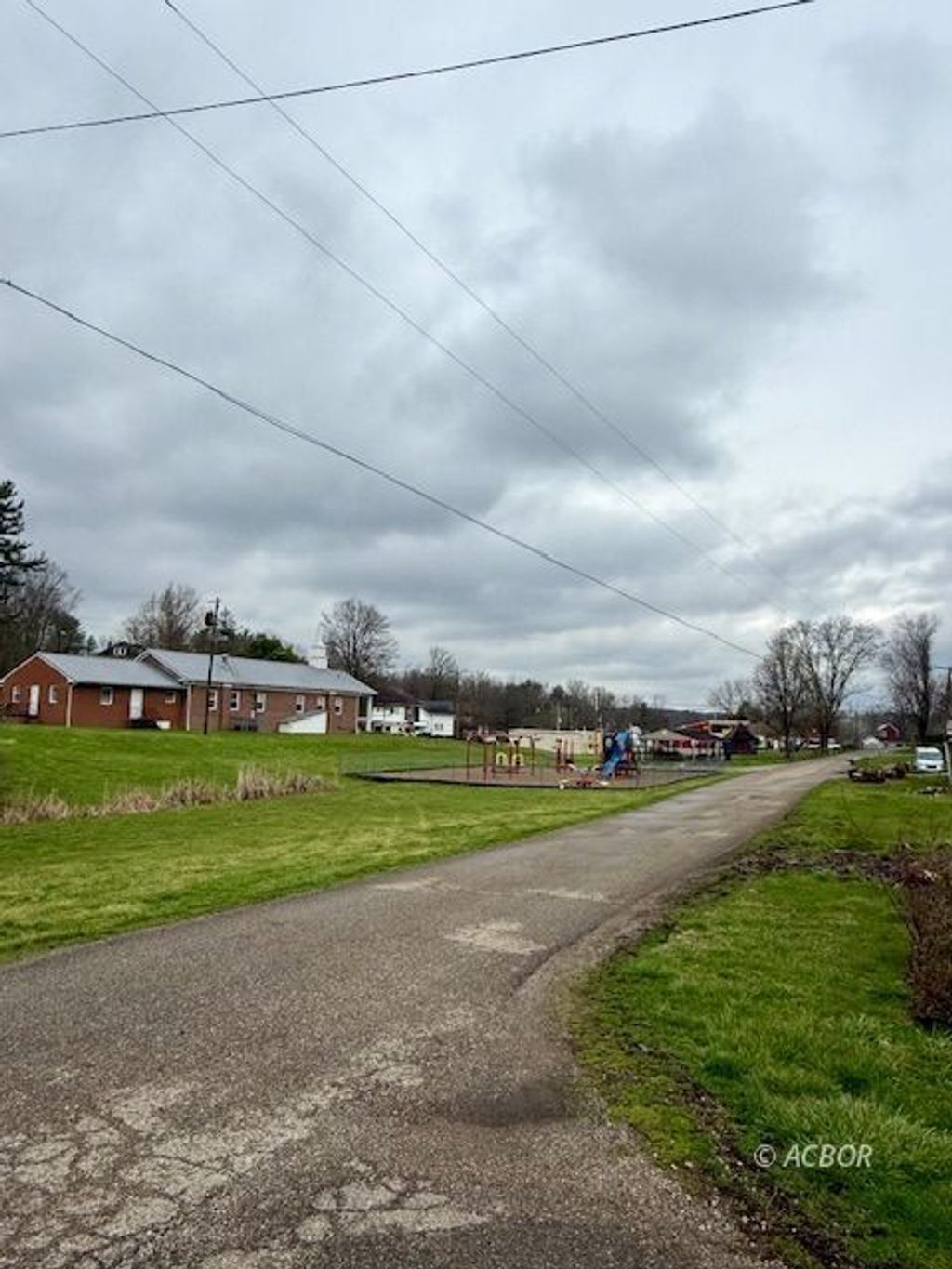 Photo of 4042 Railroad Street St, New Marshfield, OH 45766 (MLS # 2434673)