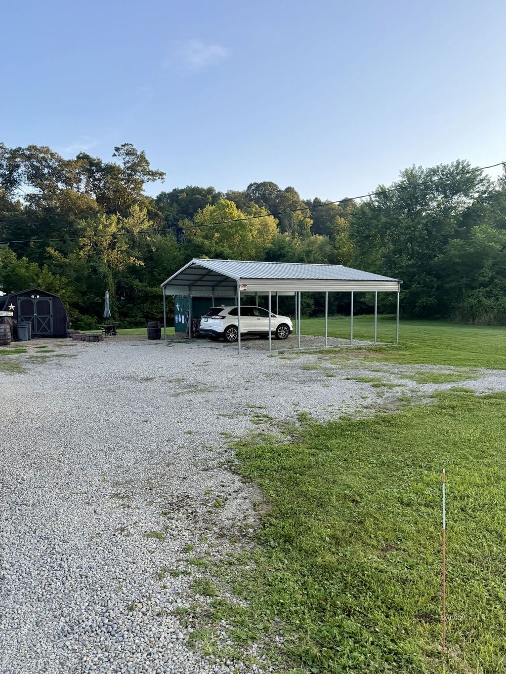 Photo of 93 E Main St, Glouster, OH 45732 (MLS # 2434043)