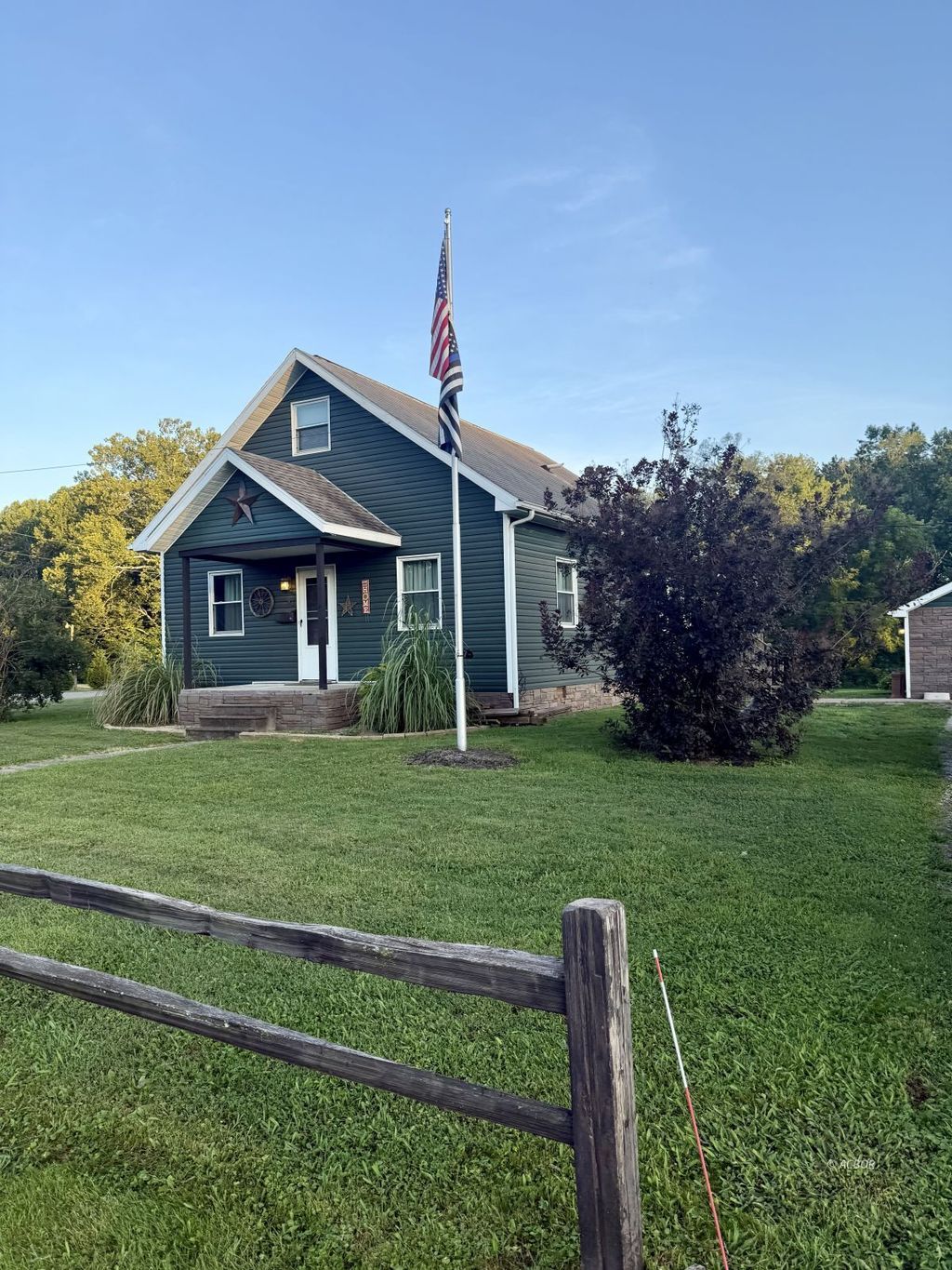 Photo of 93 E Main St, Glouster, OH 45732 (MLS # 2434043)