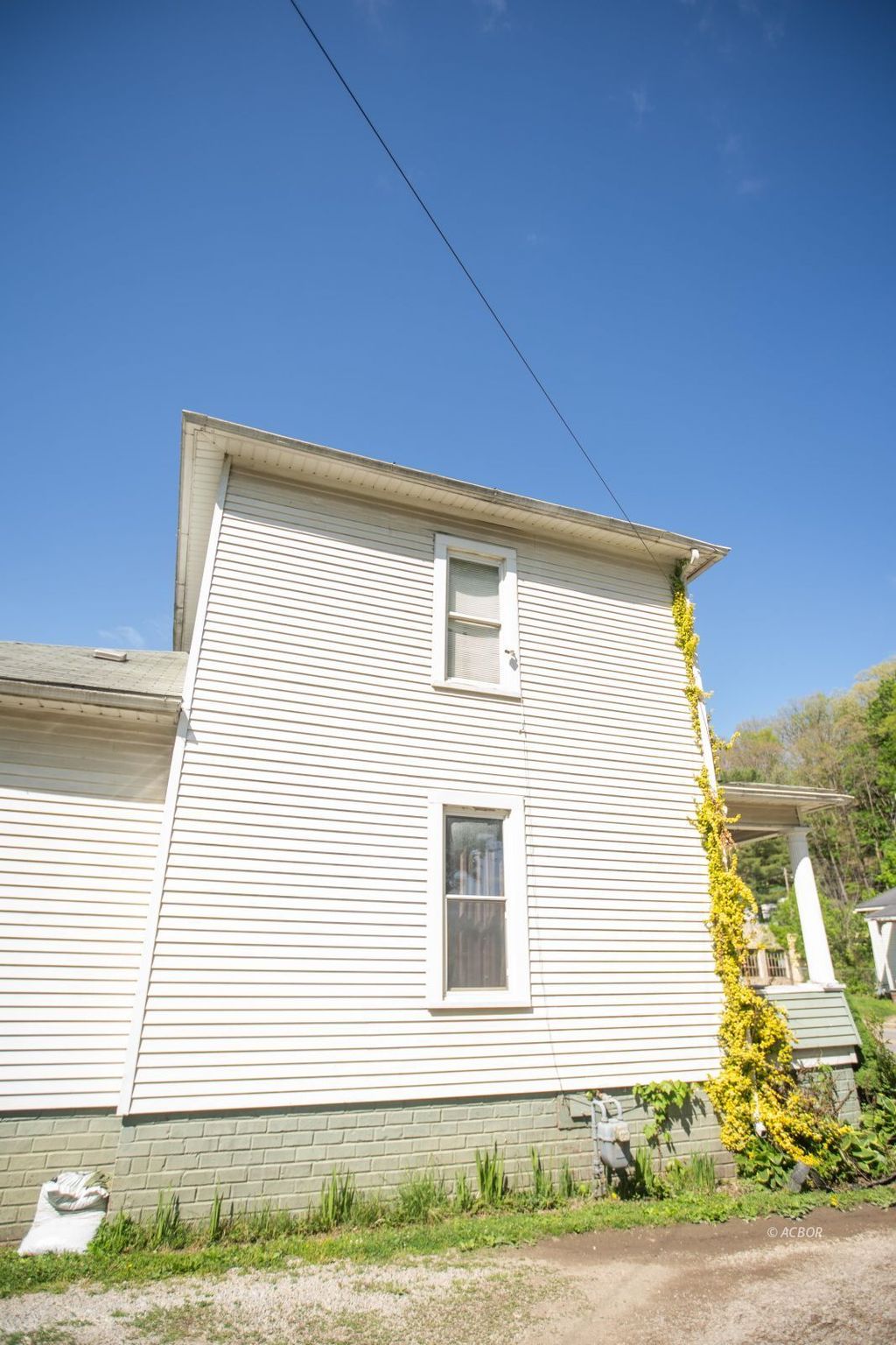 Photo of 18 S High St, Glouster, OH 45732 (MLS # 2434811)