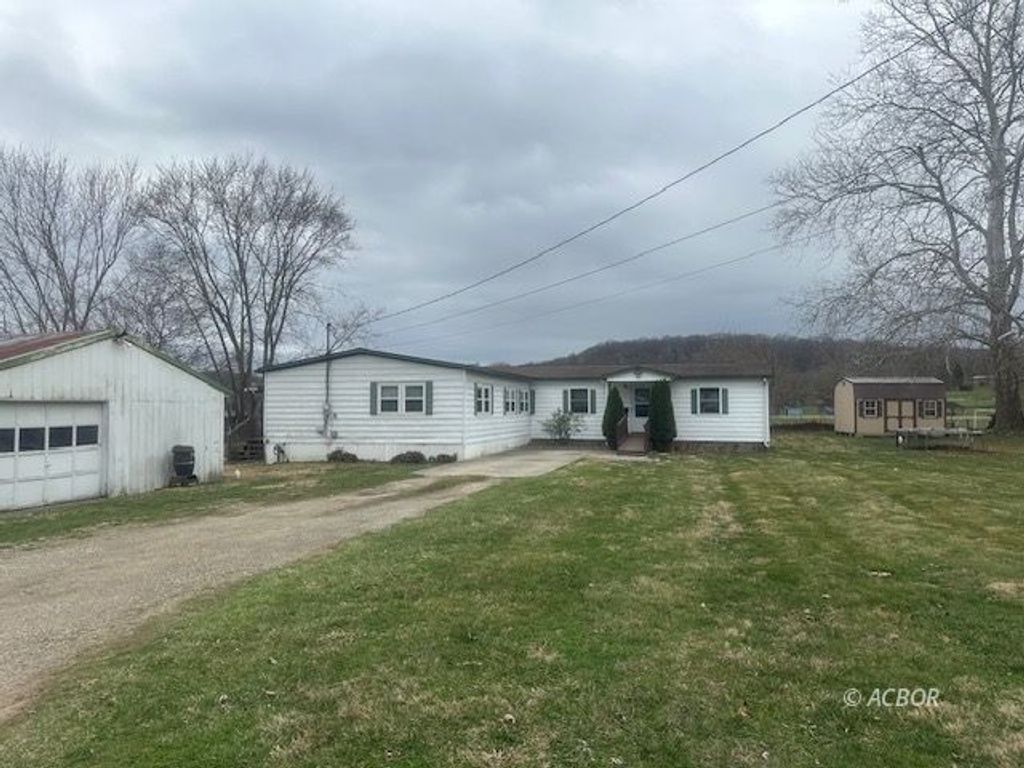 Photo of 915 Charles St, Logan, OH 43138 (MLS # 2434873)