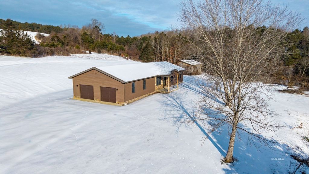 Photo of 474 Wolf Run Rd, Patriot, OH 45658 (MLS # 2434477)