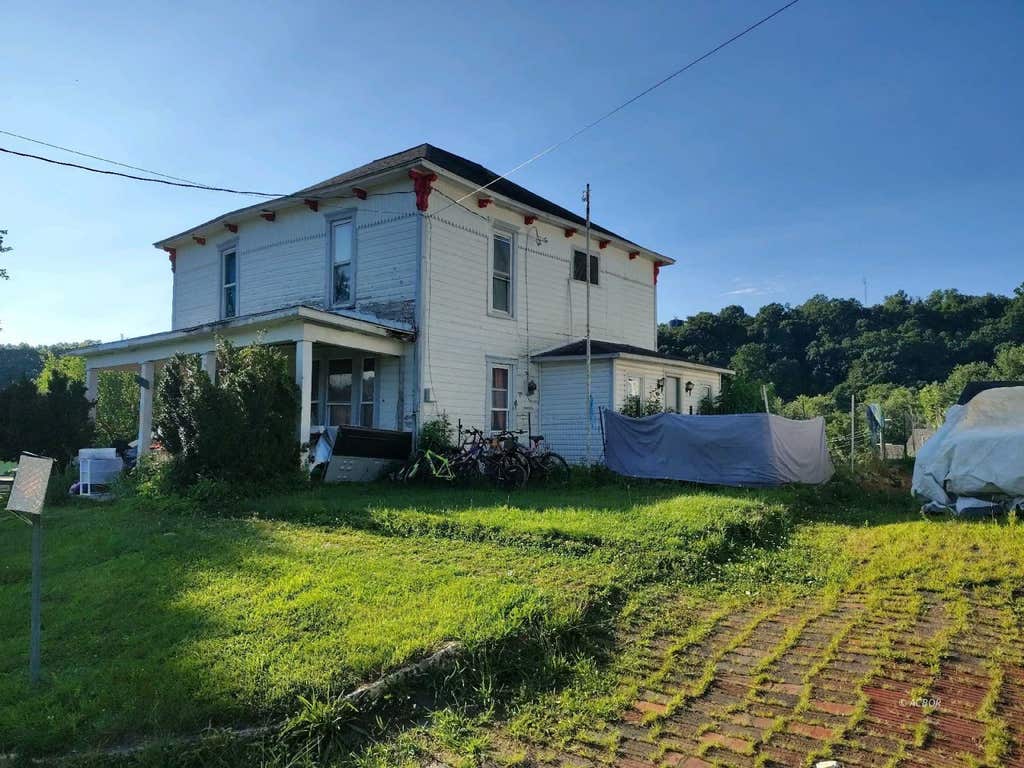 Photo of 11 Cherry St, Glouster, OH 45732 (MLS # 2435192)