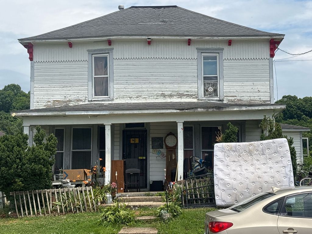 Photo of 11 Cherry St, Glouster, OH 45732 (MLS # 2435192)