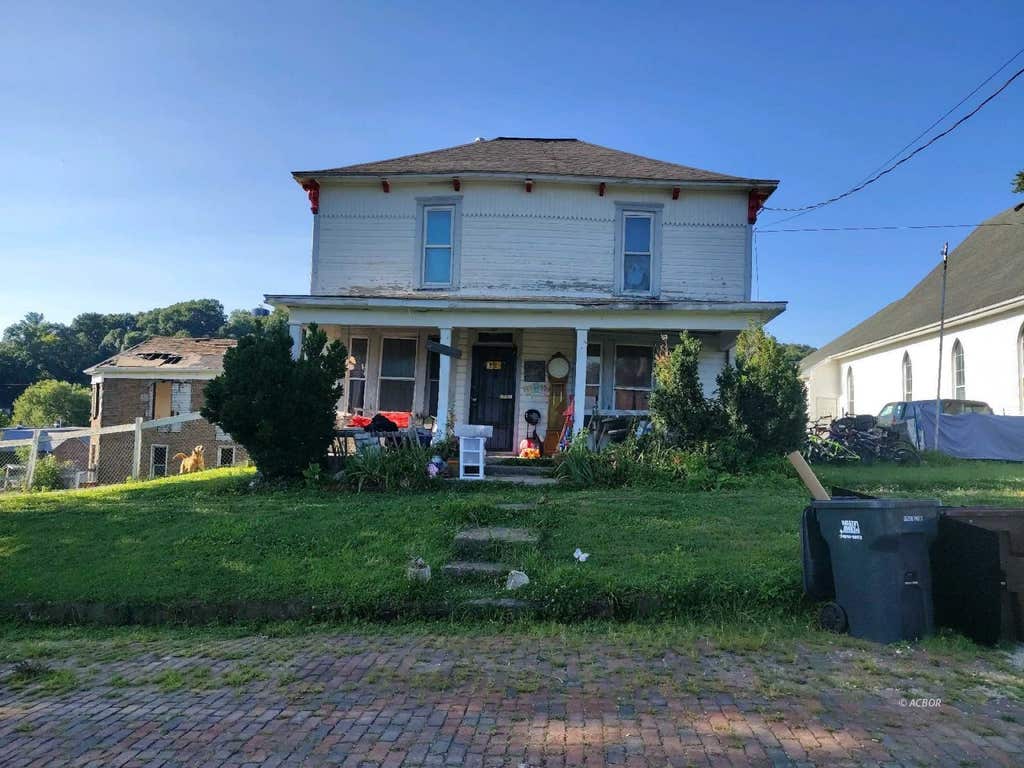 Photo of 11 Cherry St, Glouster, OH 45732 (MLS # 2435192)