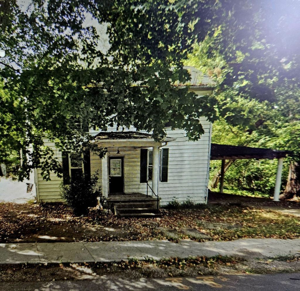 Photo of 411 S Market St, Mcarthur, OH 45651 (MLS # 2434360)
