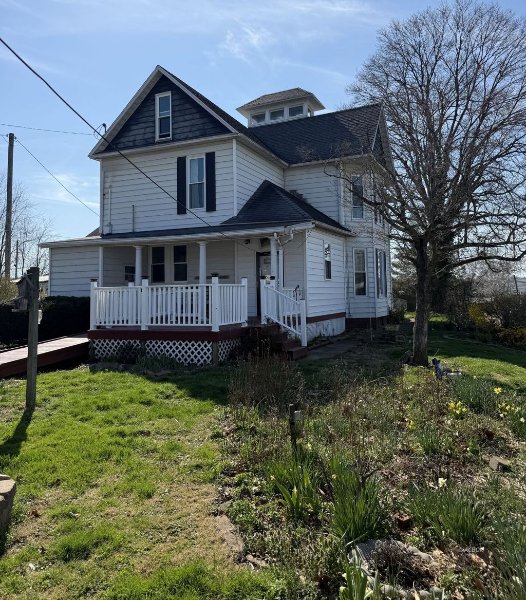 Photo of 606 Main St, Racine, OH 45771 (MLS # 2434635)