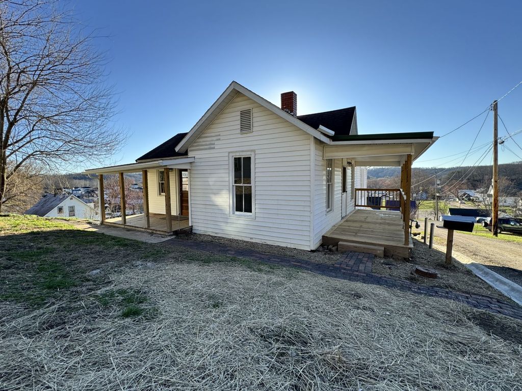 Photo of 24 Cherry St, Glouster, OH 45732 (MLS # 2434391)