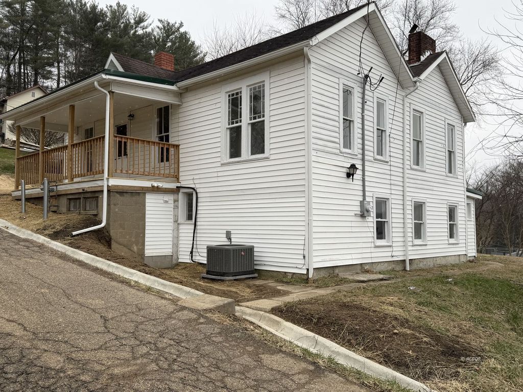 Photo of 24 Cherry St, Glouster, OH 45732 (MLS # 2434391)