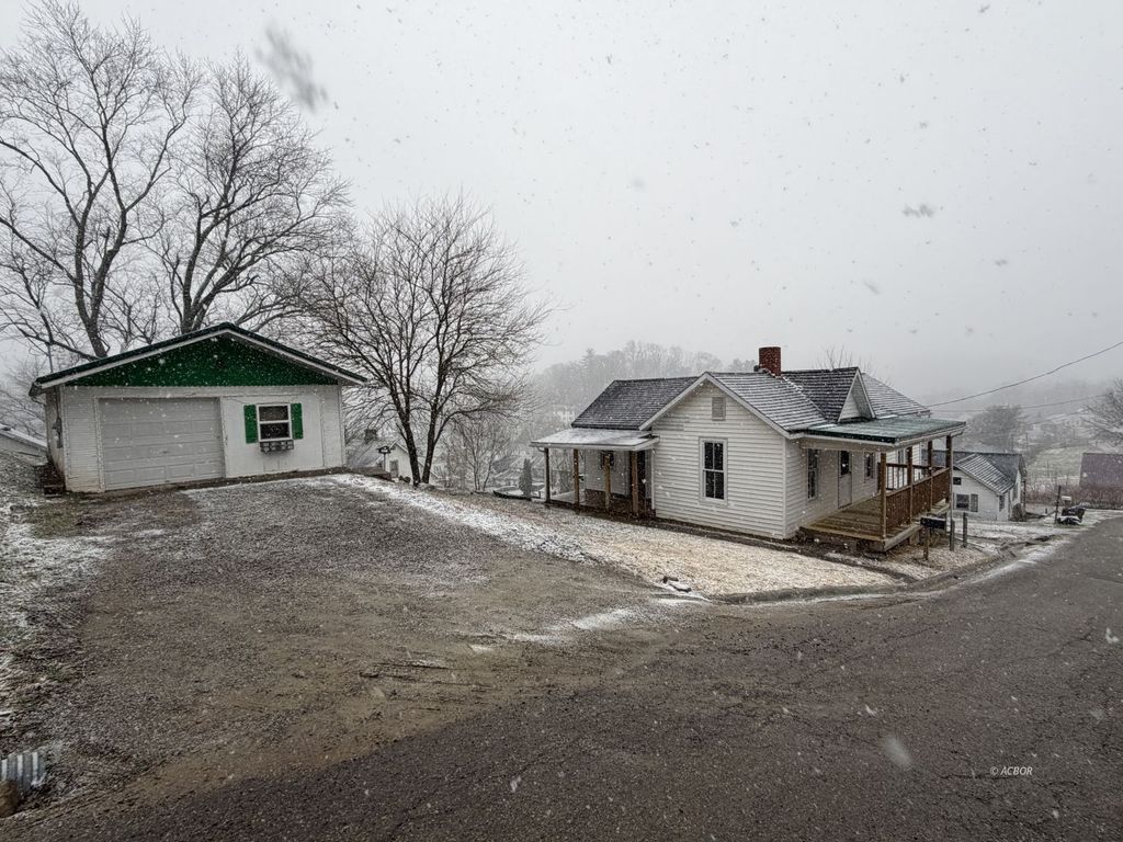 Photo of 24 Cherry St, Glouster, OH 45732 (MLS # 2434391)