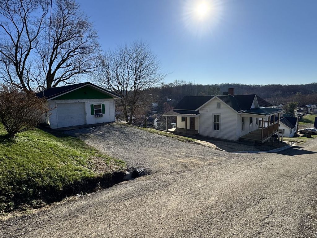 Photo of 24 Cherry St, Glouster, OH 45732 (MLS # 2434391)