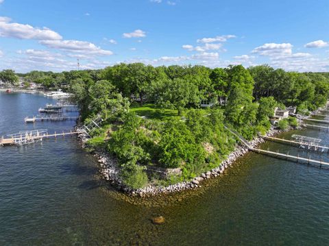 Photo of 162 Pillsbury Point Pt, Arnolds Park, IA 51331 (MLS # 260067)