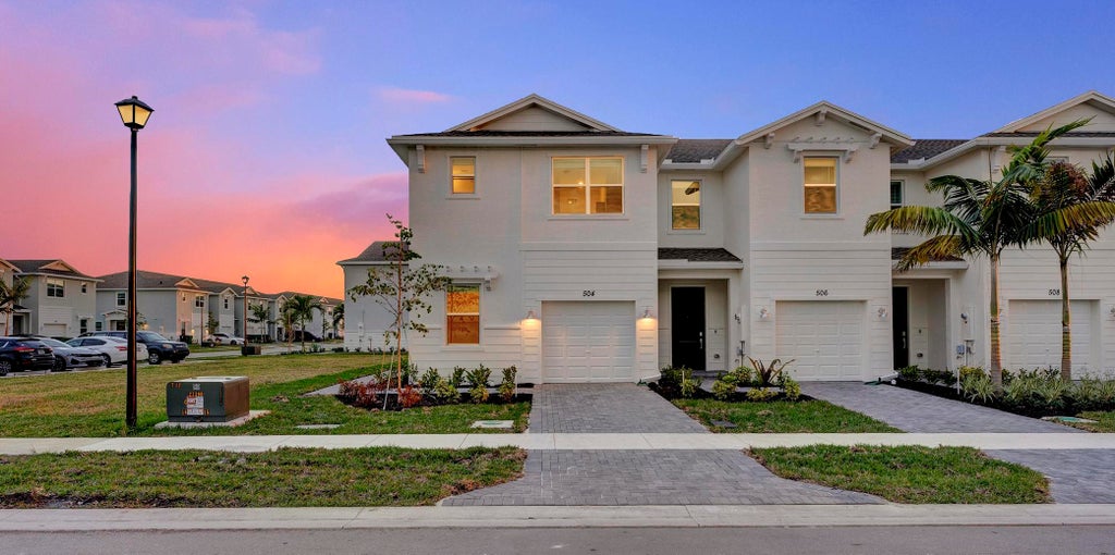 Photo of 504 SE Rivergrass Street, Port Saint Lucie, FL 34984 (MLS # R11060037)