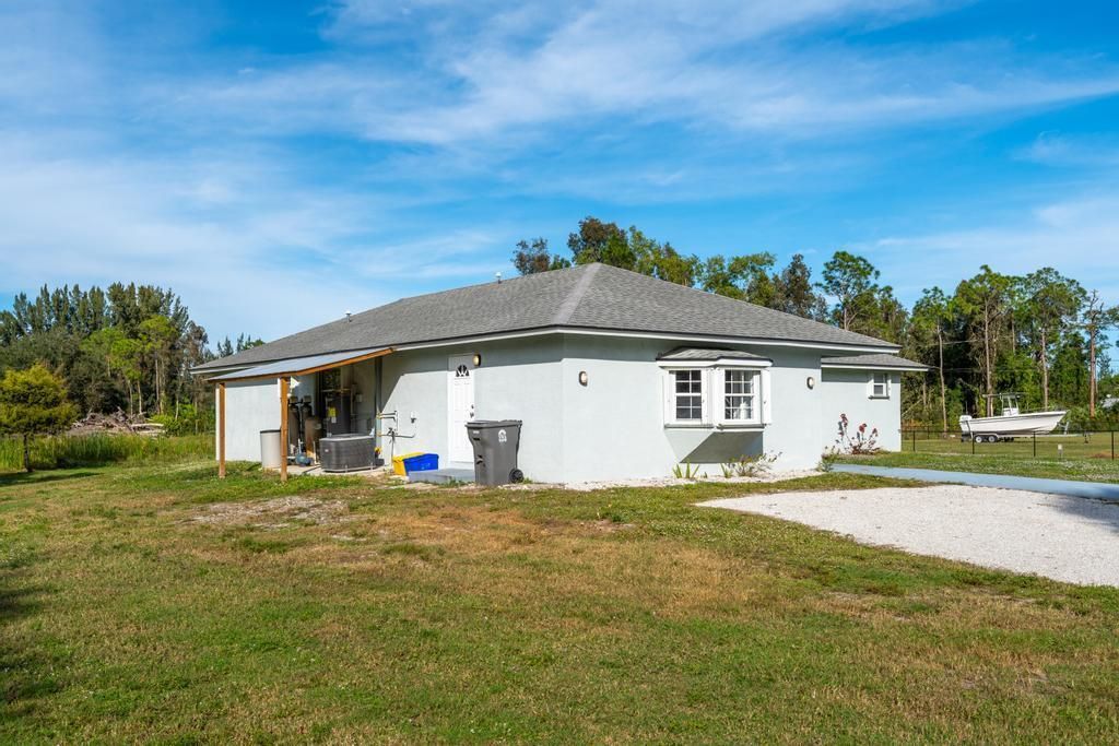 Photo of 12575 58th Place N, Royal Palm Beach, FL 33411 (MLS # R11049428)