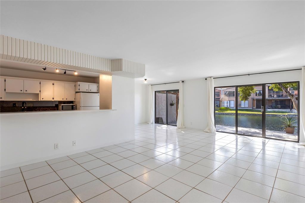 Photo of 9717 N New River Canal Road #409, Plantation, FL 33324 (MLS # F10478966)
