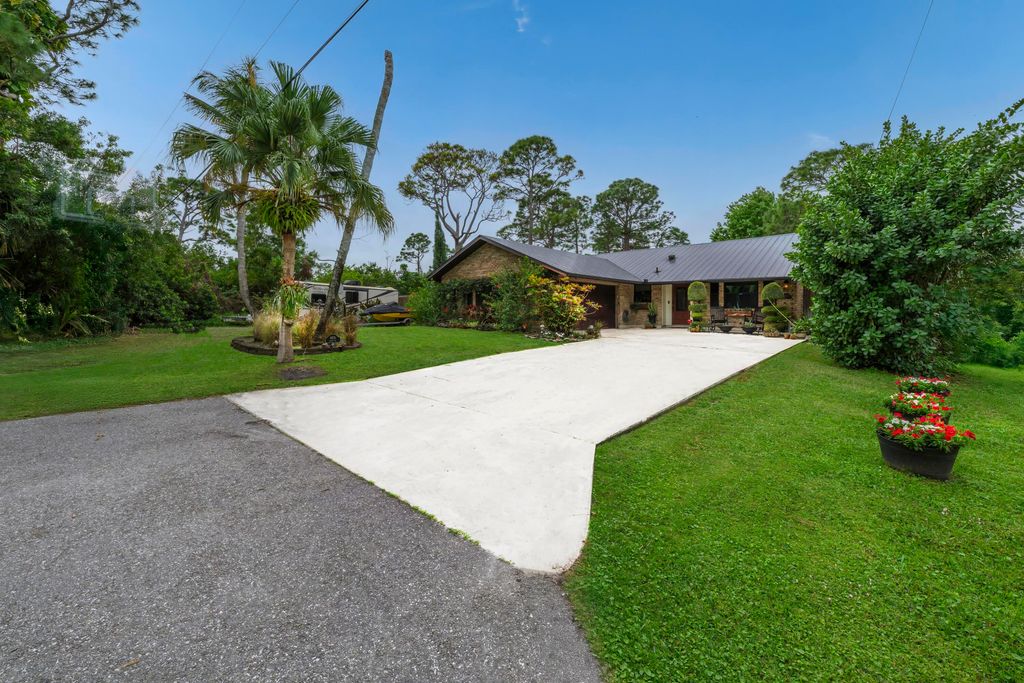 Photo of 8876 SE Sunset Drive, Hobe Sound, FL 33455 (MLS # R11065315)