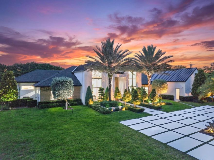 Luxurious Private Estate - New Construction (2025) | Turn-Key, Low-Maintenance Living  Set on A nearly 2-acre high-and-dry agricultural estate lot fully surrounded by a concrete wall, this exceptionally private and secure residence is accessed through automated entry gates and protected by a full security camera system—creating a true lock-and-leave level of privacy and peace of mind.  With over 5,000 square feet of thoughtfully designed living space, the home offers 6 bedrooms, 5 bathrooms, and an oversized 4-car garage with ceiling height and layout suitable for lifts. A long, private driveway provides extensive parking while keeping the home visually and physically separated from the outside world.  This home was designed for modern living without modern headaches. Clean architectural lines and contemporary materials are intentionally paired with warm finishes, natural textures, and a highly livable layout resulting in a home that feels calm, comfortable, and effortless to live in. Every design choice prioritizes daily ease, long-term durability, and minimal upkeep.  As a brand-new 2025 construction, the property eliminates the concerns that come with older estates, no deferred maintenance, no costly renovations, and no system upgrades needed. Everything from structure to mechanicals is new, efficient, and under warranty, allowing owners to simply move in and enjoy.  Built well beyond local standards, the home features upgraded steel reinforcement for superior structural integrity and storm resistance. High-efficiency mechanical and insulation systems significantly reduce ongoing energy costs while maintaining consistent interior comfort year-round. A gas water heater provides reliable, endless hot water without the limitations of electric systems.  The resort-style outdoor environment is equally low-maintenance and highly usable, featuring a stunning pool and private expansive open yard with Estate-style landscaping that enhances privacy while remaining clean, manageable, and intentionally designed for longevity rather than constant upkeep.  Additional highlights include:  A complete indoor health and wellness retreat including sauna, steam room, built-in cold plunge, as well as dual outdoor spa showers.   City water  Hidden, climate-controlled attic storage rooms  Modern systems engineered for long-term reliability  Builder's personal residence with no expense spared  New construction warranty for peace of mind  Still time to participate in select finishing touches  This is true turn-key estate living, a modern, warm, and highly private home designed so the next owner can focus on living, not maintaining. No projects, no renovations, no surprises, just a secure, effortless lifestyle from day one.