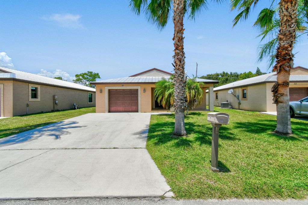 Photo of 30 Mediterranean Boulevard N, Port Saint Lucie, FL 34952 (MLS # R11007750)
