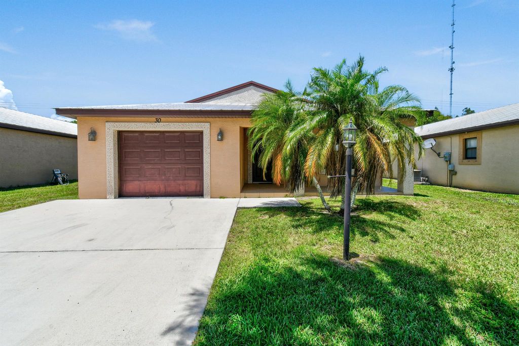 Photo of 30 Mediterranean Boulevard N, Port Saint Lucie, FL 34952 (MLS # R11007750)