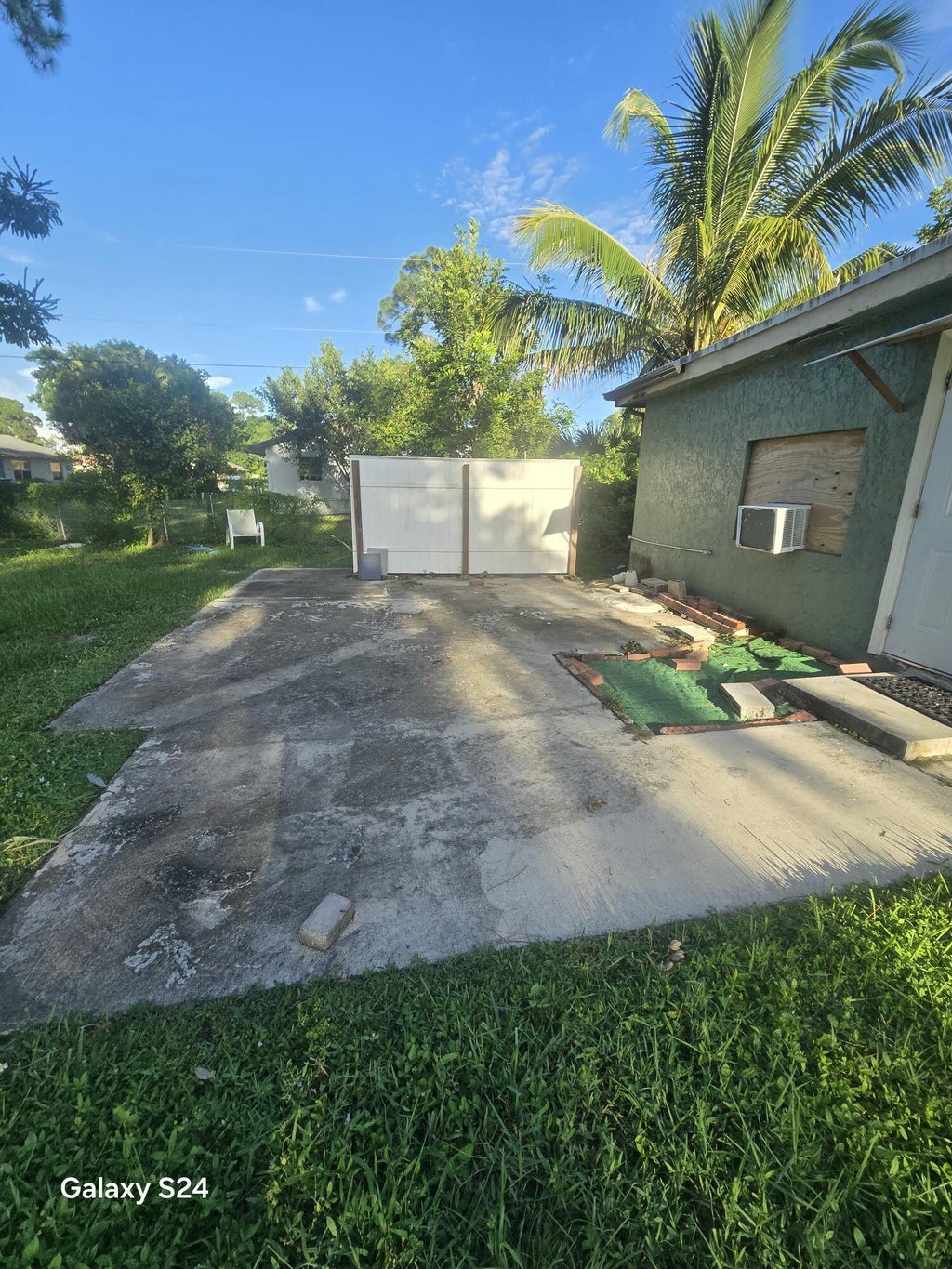 Photo of 702 FLEMING Avenue, Greenacres, FL 33463 (MLS # B26075352)