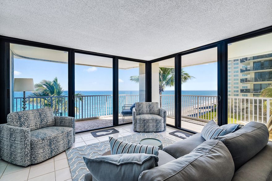 AVAILABLE April 1, 2026 for annual rental. This beautiful 2 BR / 2 BA unit has a breathtaking direct view of the ocean. It has one covered carport parking spot and shared free laundry room conveniently located on every floor right outside the unit. Dunes Towers is on the pristine north end of Singer Island. Come and enjoy the outstanding blue waters of The Atlantic Ocean and The Intracoastal Waterway views from the wrap around balconies. Lovely amenities include heated pool with ocean access, resident's clubhouse, fitness room and BBQ picnic area.