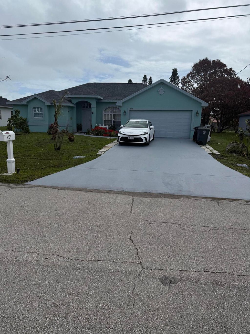 Photo of 2541 SE Rock Springs Drive, Port Saint Lucie, FL 34952 (MLS # B26012829)