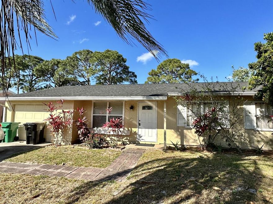 Centrally located 3 bedroom home in popular Floresta area.  Newer roof & AC. Tile floors, newer bath vanities. Use your imagination with the spacious, fenced back yard. Close to restaurants, shopping, Turnpike, Crosstown Parkway. Don't miss it!