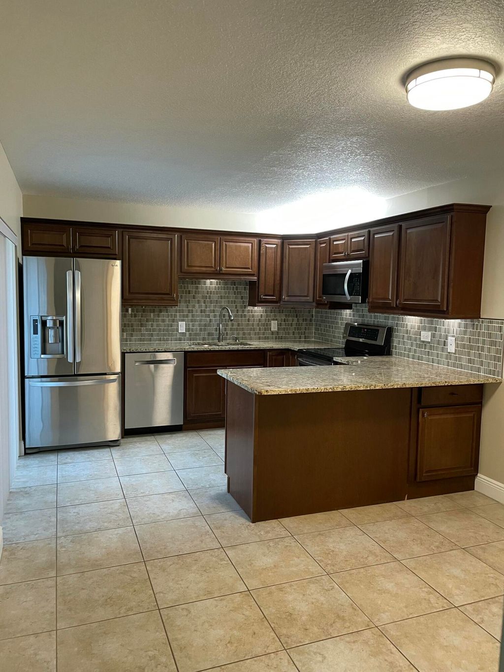 Photo of 728 7th Lane, Palm Beach Gardens, FL 33418 (MLS # R11078901)